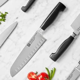 ZWILLING | VIER STERNE - Santoku- mit Kullenschliff - 180mm